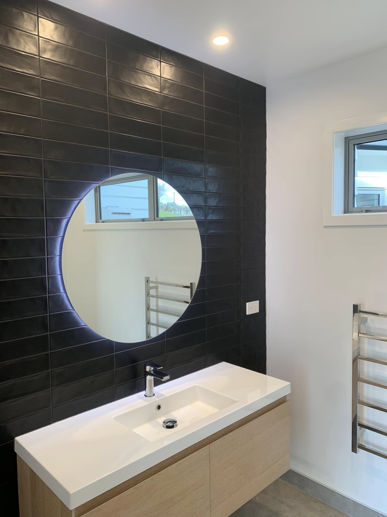 Bathroom mirror light installation by electrician Te Awamutu