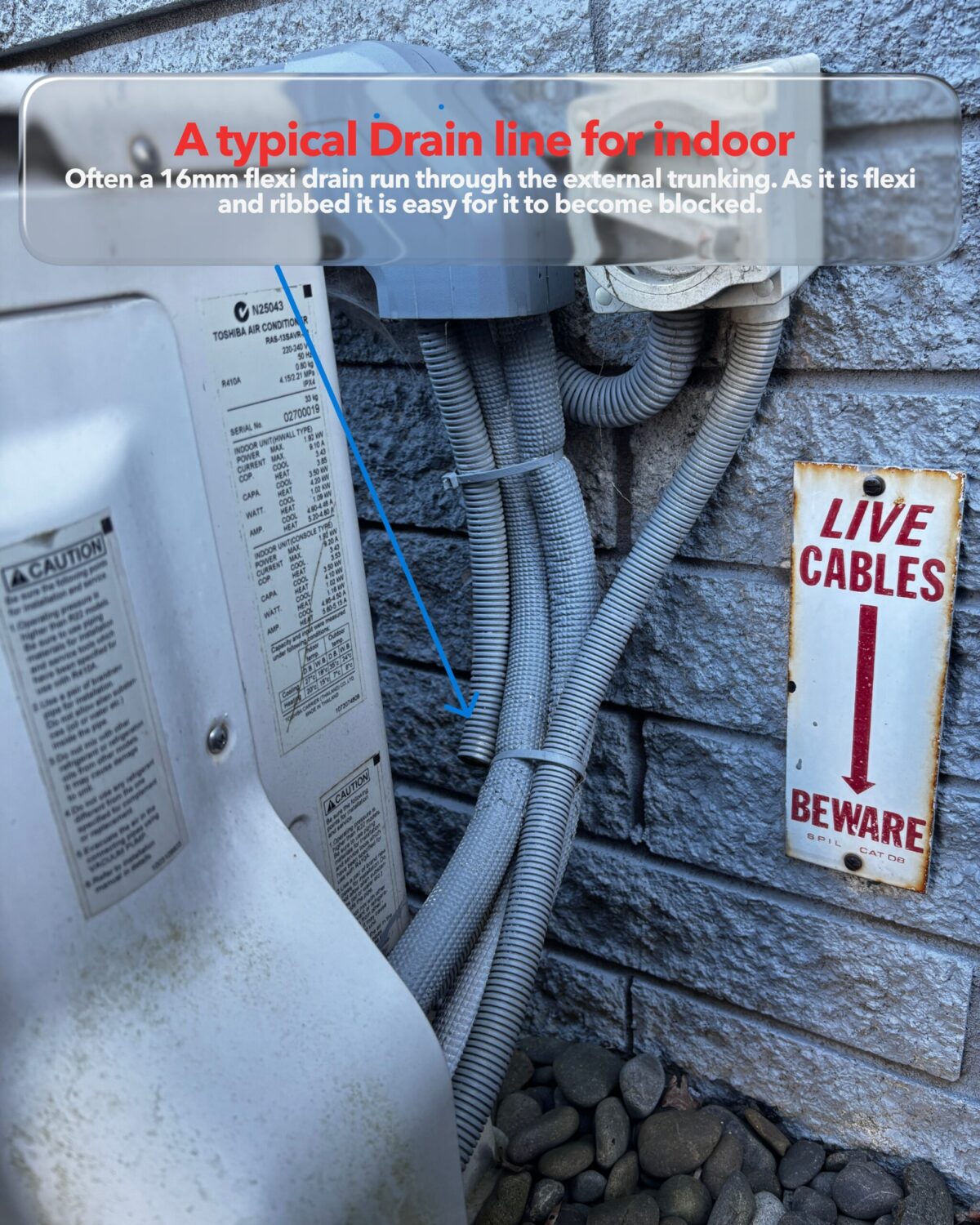 Diagram showing heat pump indoor drain tray and condensate drain pipe running outside